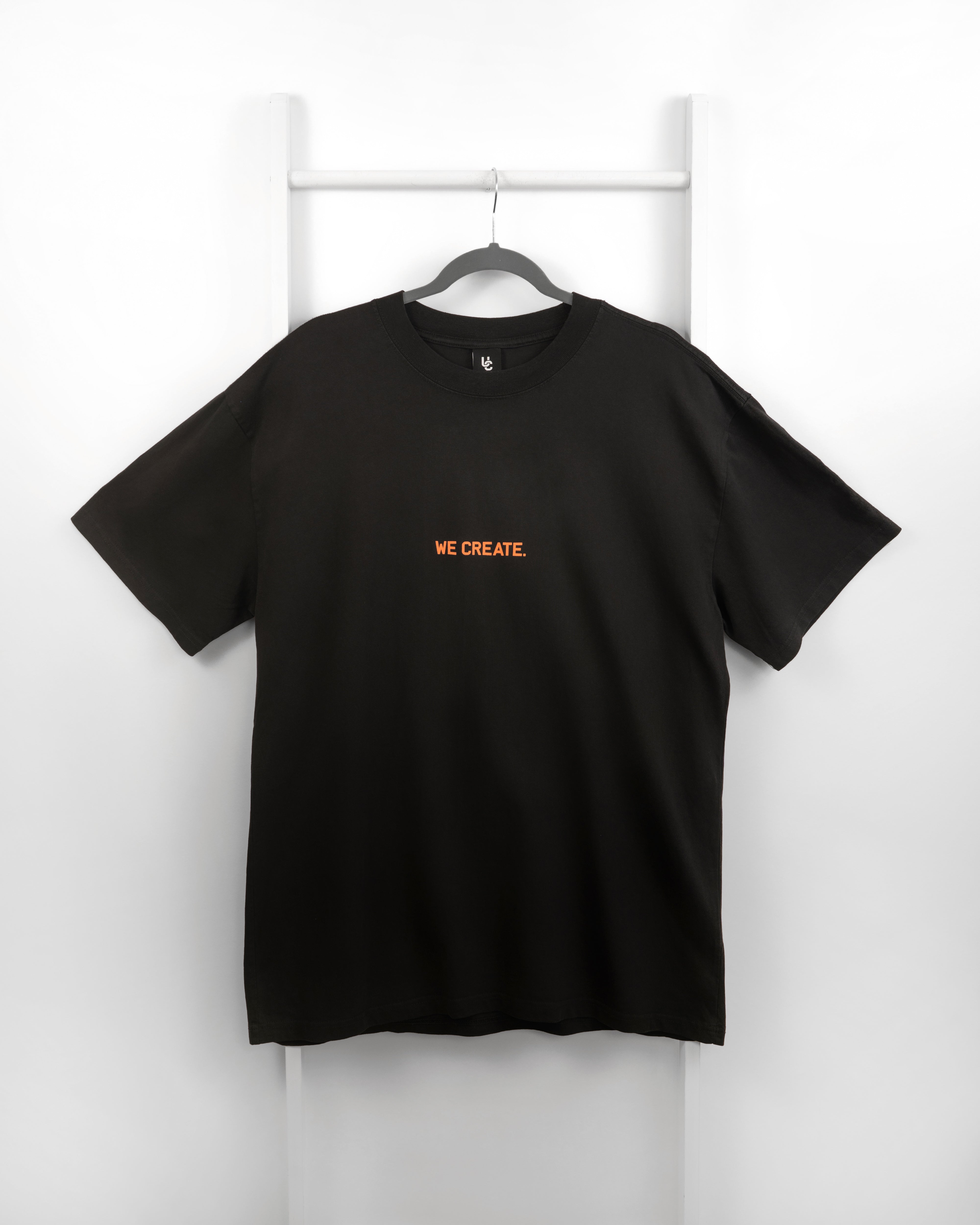 We Create 3D UC AW25 T-Shirt Black / Orange)