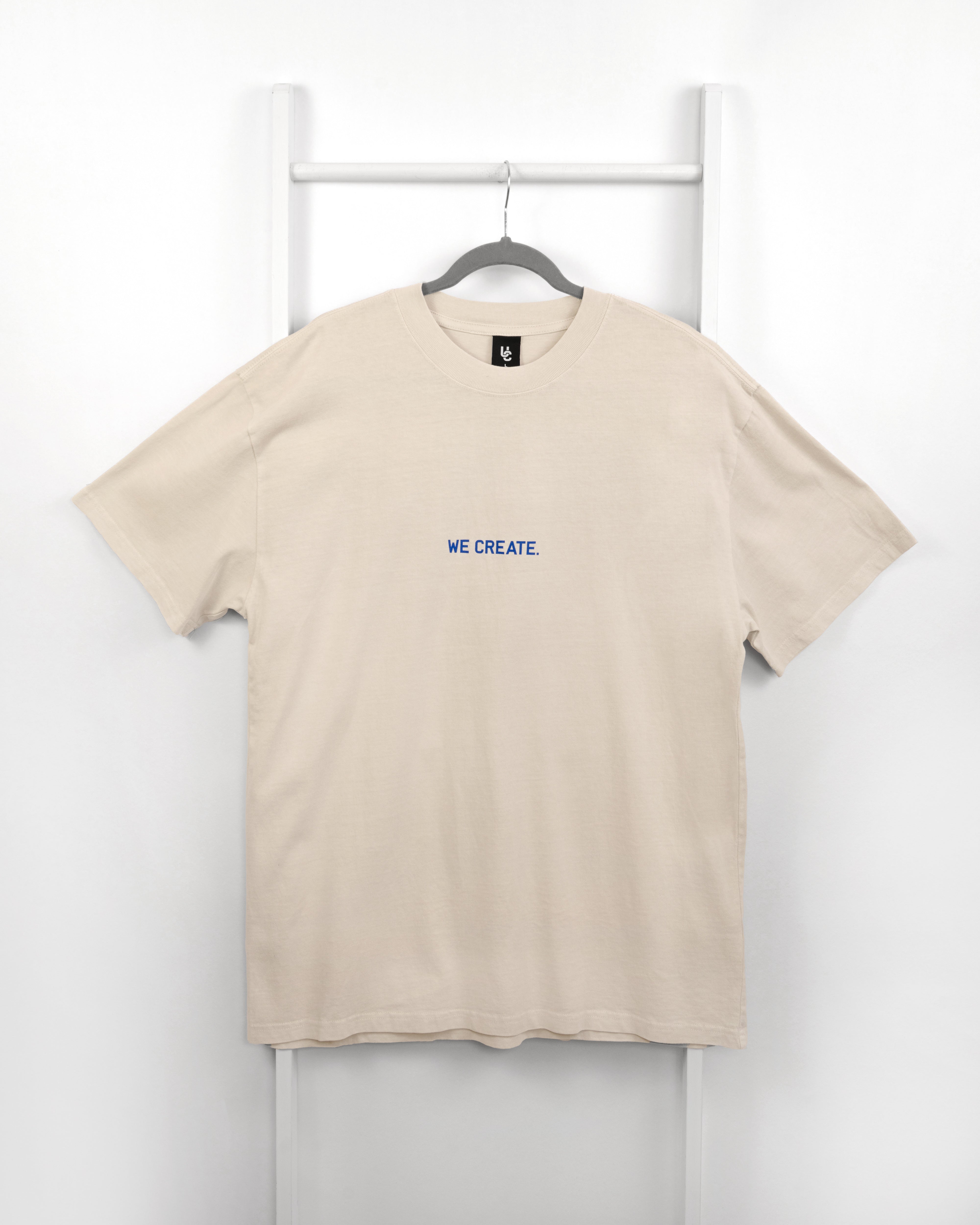 We Create 3D UC AW25 T-Shirt (Bone / Blue)