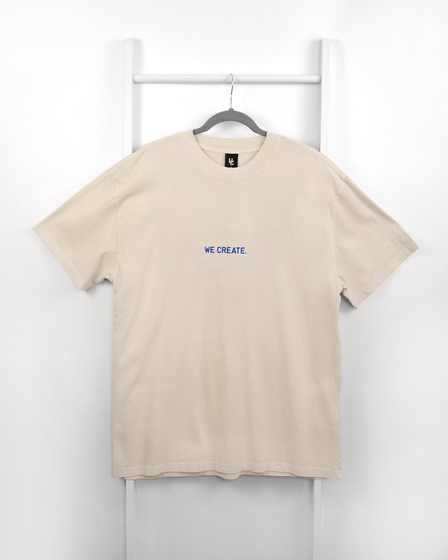 We Create 3D UC AW25 T-Shirt (Bone / Blue)
