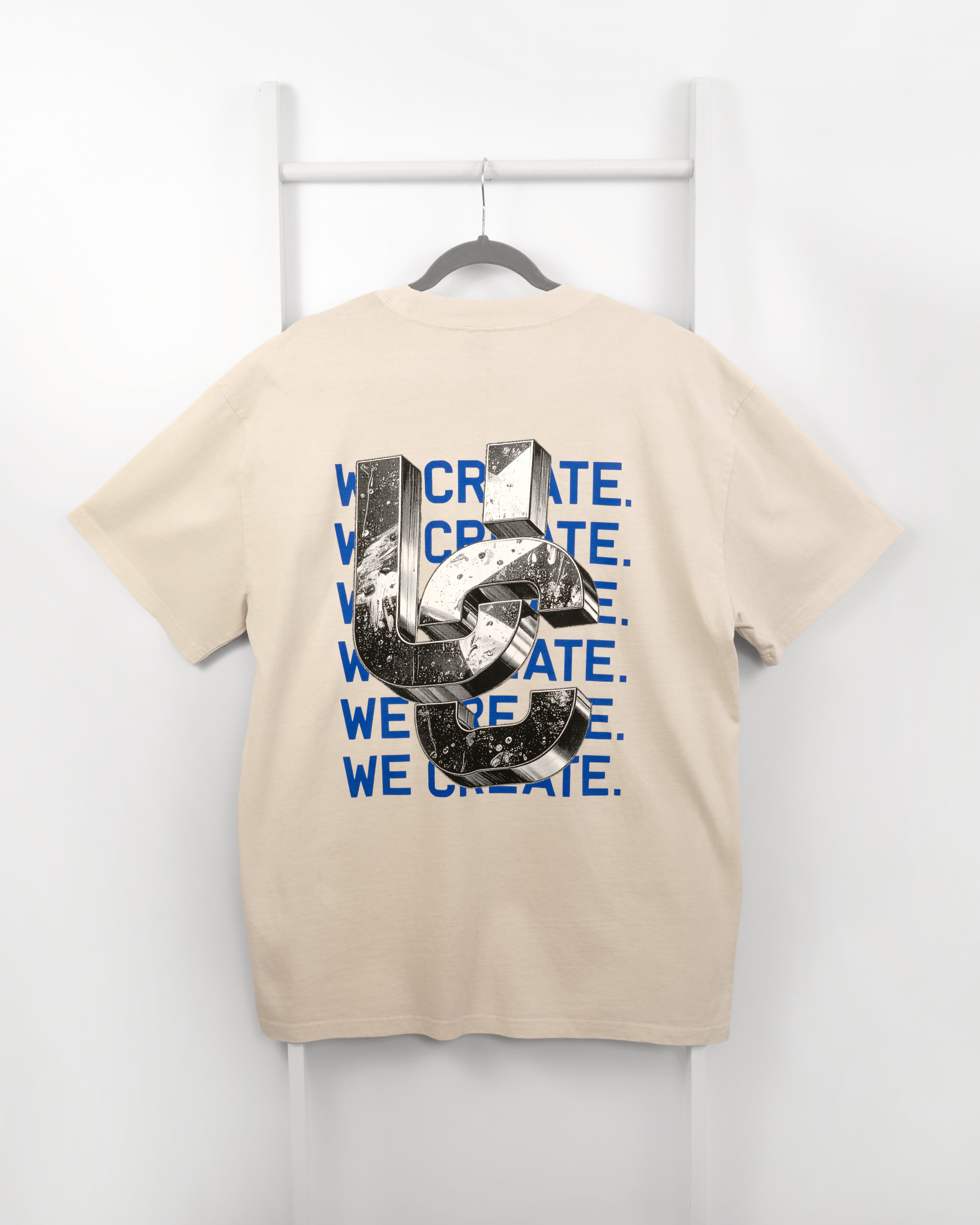 We Create 3D UC AW25 T-Shirt (Bone / Blue)